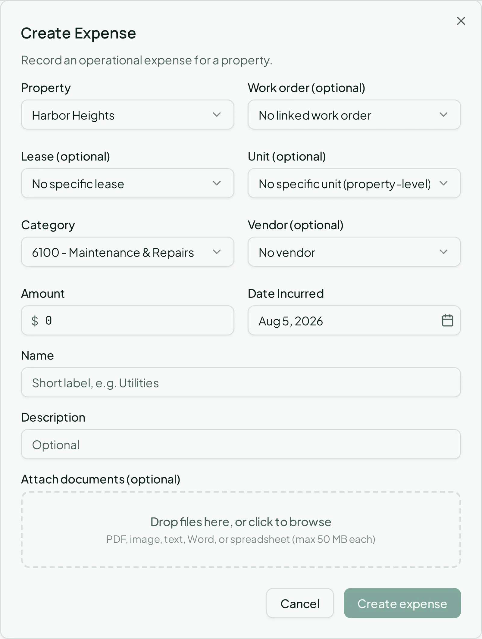 The Create Expense dialog, where a vendor bill is recorded against a property and account.