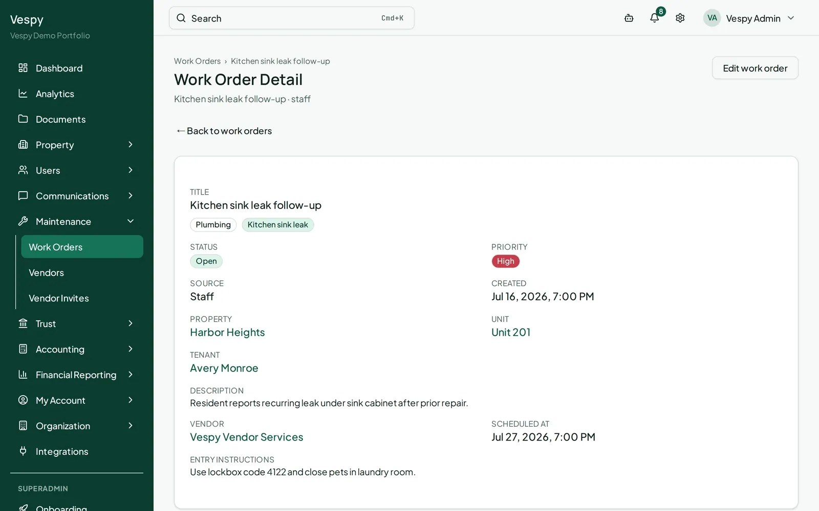 A work order’s detail page, where a vendor is assigned and the status moves through its stages.